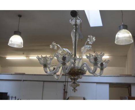 An Italian Murano glass clear crystal six branch pendant light fitting complete with two leaves and two daffodils, with gilt 