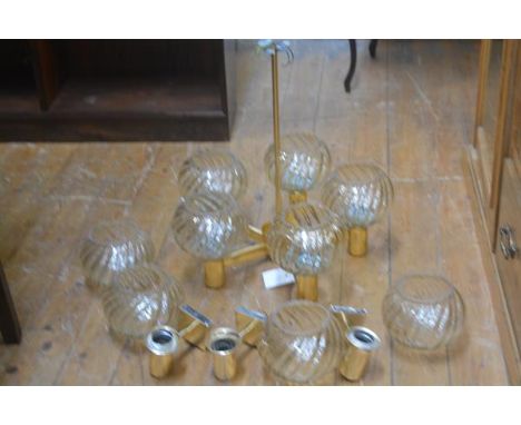 A 1960's copper finish five branch pendant light fitting with lustre fluted shades and a set of three matching wall lights, t