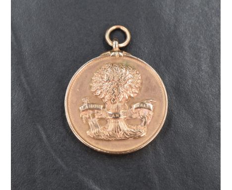 A large 9ct gold commemorative medallion dated 1924 regarding the Pioneer Society now known as the CO-OP Society, bearing pre