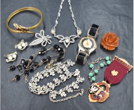A small selection of vintage costume jewellery including rolled gold serpent bangle, a Smiths Empire wrist watch, Marcasite j