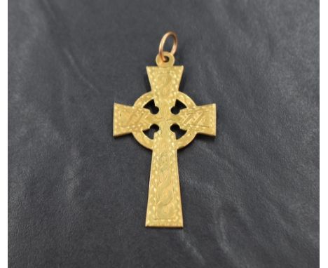 A 9ct gold Celtic cross pendant, having decorative engraved detail, 5.2cm including loop, 3.8g