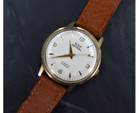 A gent's 9ct gold Smiths Astral manual wrist watch having Arabic quarter numerals, baton markers and a red pointer sweeping s