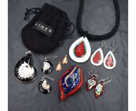 An assortment of necklace and drop earring sets, comprising an ammonite set, a red glass petal motif set and a shell mosaic s