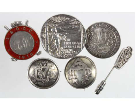 Golf related silver badges (four), one silver stick pin and one silver button, six items in all, weight of all  items 49.7gms