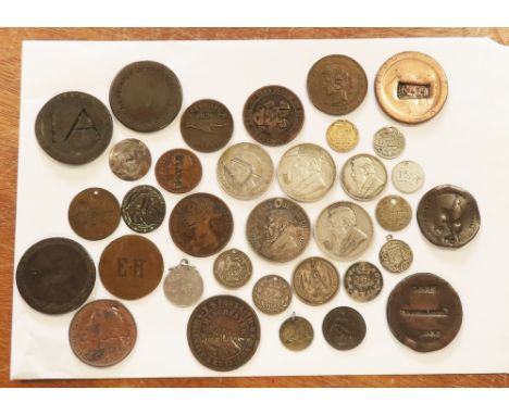 Countermarked (15) and engraved (19) coins and tokens; an interesting lot including several "trench art" hat and pipe South A