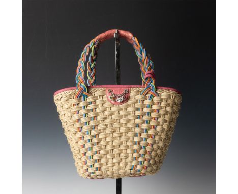 Straw handbag with colorful leather accents and straps. Open top with interior pockets and zippered middle section. Length of
