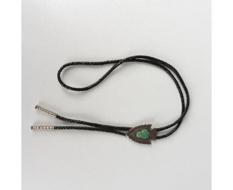 This handsome Southwestern style bolo tie features a silver metal arrow with a turquoise stone nugget. Dimensions: 36.5"LCond