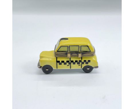 Hand painted porcelain treasure box with bronze tone hinged hardware modelled as a yellow taxi cab with black accents. Marked
