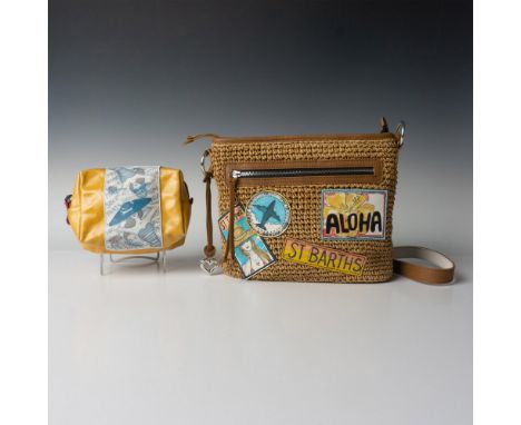 Straw handbag with interior pockets and zippered top closure decorated with patches from travel locations, 10.5"L x 2.5"W x 1