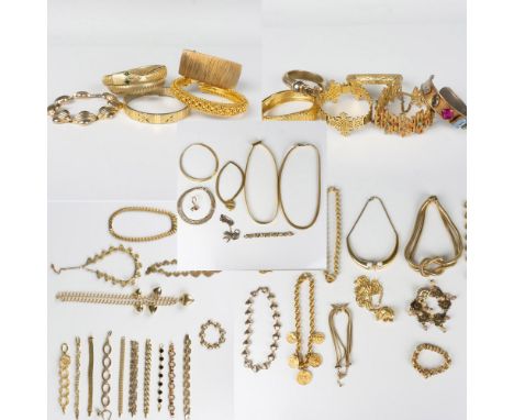 Large lot of sixty five gold metal necklaces, belts and bracelets. Several are by designers such as Monet and Corro. Dimensio