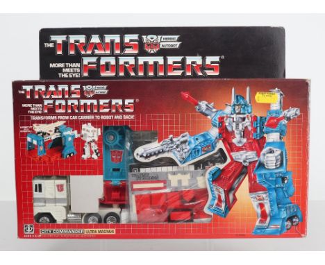 Boxed Hasbro G1 Transformers City Commander Ultra Magnus, blue/silver head, 1985 issue, transforms from car carrier to robot 