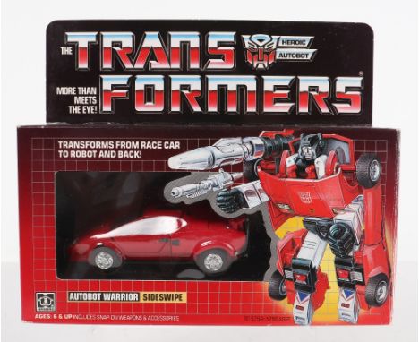 Boxed Hasbro G1 Transformers Autobot Warrior Sideswipe 1984 issue, transforms from race car to robot and back, in near mint o