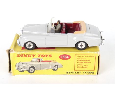 Dinky Toys 194 Bentley Coupe, grey body, maroon seats, tan tonneau, with driver, spun wheels, in near mint original condition