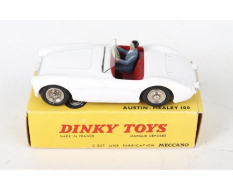 French Dinky Toys 546 Austin Healey 100, white body, red interior, driver, spun wheel hubs, in near mint original condition, 