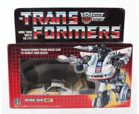 Boxed Hasbro G1 Transformers Autobot Agent ‘Jazz’ 1984 issue, transforms from race car to robot and back, cream/white body, i