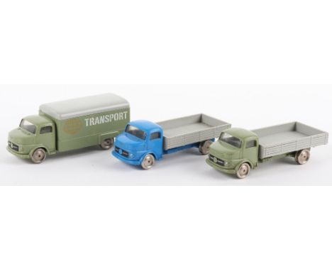 Three vintage Lego Mercedes trucks, Transport lorry green with grey roof and two open back trucks, one green cab other blue, 