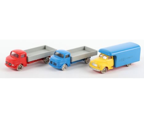 Three vintage Lego trucks, two Mercedes open back trucks, one red cab other blue and a Lego Transport lorry yellow cab, red c