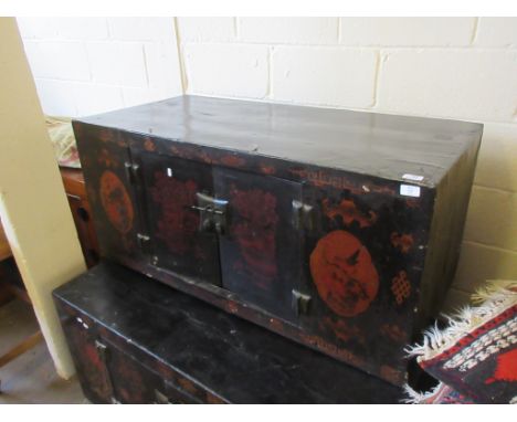 MODERN CHINESE STYLE CUPBOARD MODELLED AS A TRUNK WITH DOUBLE FORWARD OPENING DOORS, 122CM WIDE