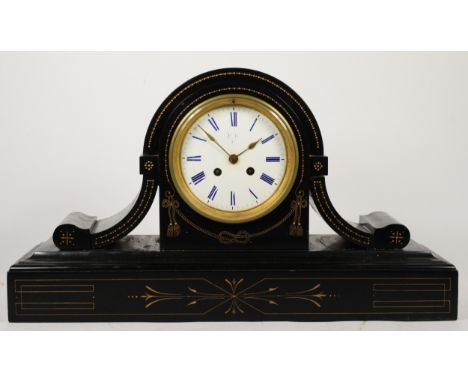A Victorian slate mantel clock, having floral gilt decoration with brass bezel, enameled dial and Roman numerals, the 8 day F