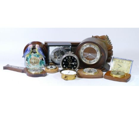 A collection of mechanical and quartz clocks, to include desk clocks, carriage clocks, miniature clocks, travel clocks, barom