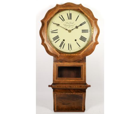 A late 19th century drop dial wall clock, having inlaid walnut veneer case, with enameled dial and roman numerals, housing an