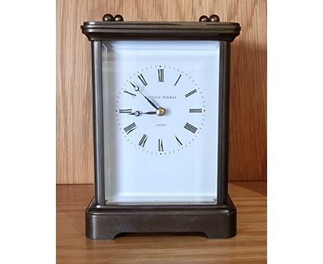 A Matthew Norman of London brass carriage clock, with jewelled 8 day movement.15cm tall. 