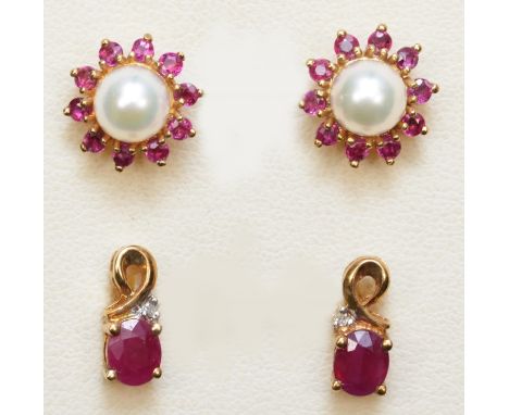 A 9ct gold pair of cultured pearl and ruby cluster earstuds and a ruby and diamond pair of earstuds, 3.2gm 