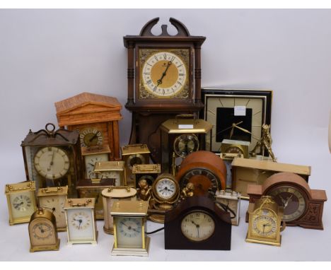 A collection of quartz and mechanical clocks, to include a Schmeckbecher wall clock, a Simpsons alarm clock, a Westclox alarm
