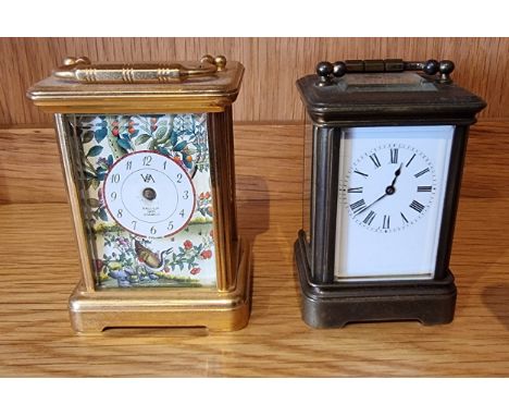 An English miniature brass carriage clock, having painted enamel dial with Arabic numerals, 8cm tall (at fault) together with