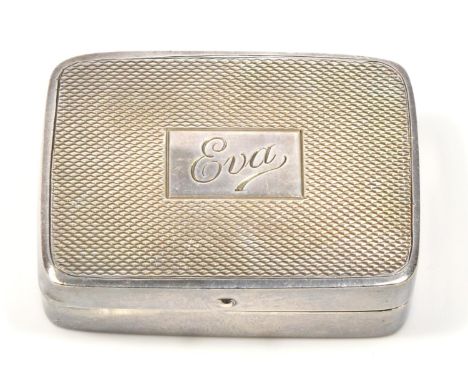 A silver pill box, Birmingham 1964, engine turned decoration and inscribed EVA, 5 x 3.5 x 1.5cm, 27gm