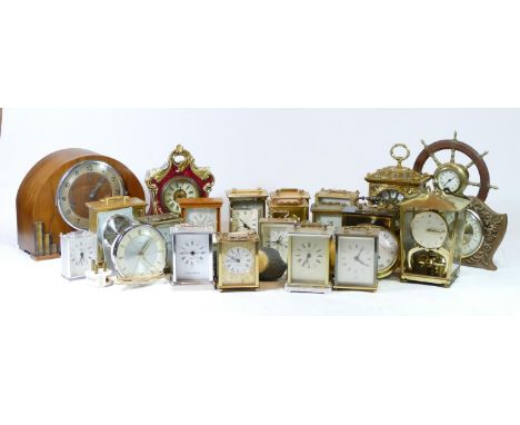 A collection of mechanical and quartz clocks, to include a Baynard 8day carriage clock (missing glass), mantle clocks, Westmi