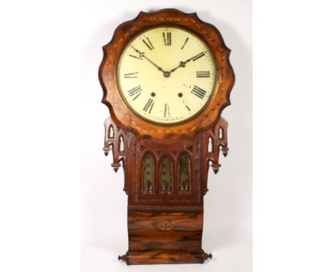 An inlaid mahogany and walnut veneered drop dial American wall clock, circa 1900s, the brass bezel with painted dial housing 