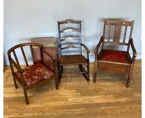 An Art Deco tub chair, together with an Edwardian mahogany commode chair, a ladderback rocking chair, an oak carver chair and