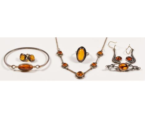 A collection of silver set amber jewellery, necklace, bangle, ring, brooch and two pairs of ear rings, 31gm. 