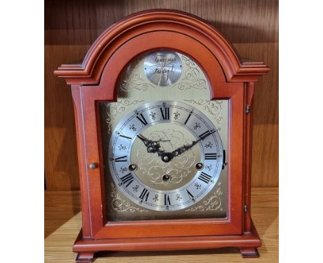 A modern Rapport mahogany cased German bracket clock, the gilt brass dial with Roman numerals bearing Tempus Fugit above, hou