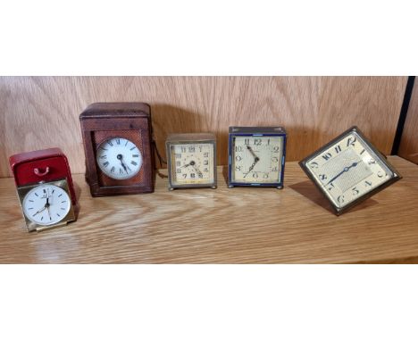 Four 1920s/30s Art Deco bedside/desk clocks, having French, German and Swiss movements, together with a 1960s Appella traveli