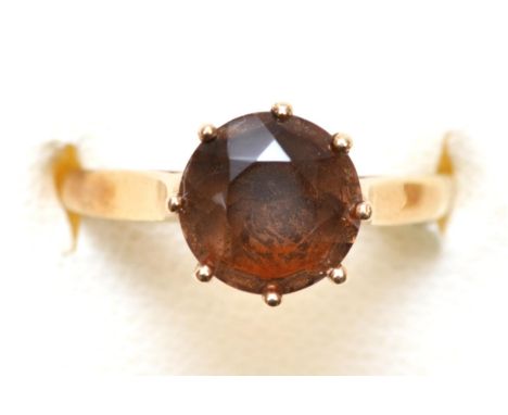 A 9ct gold and smokey quartz single stone ring, K 1/2, 2.3gm 