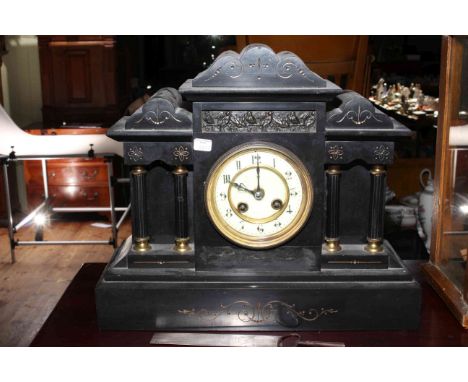 Late Victorian slate mantel clock with enamel dial, 36cm.
