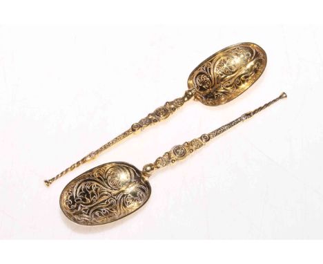 Pair silver gilt 'anointing' spoons, hallmarked for London 1910, 17cm length.