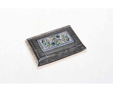 Islamic silver box with engraved decoration and enamel to lid and base, marks to lid reveal, 10cm across.