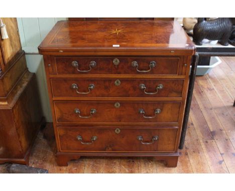 Inlaid burr mahogany and mahogany four drawer fold top bachelors chest on bracket feet, 82cm high by 79cm wide by 51cm deep.