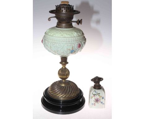 Victorian floral glass reservoir and brass oil lamp with floral design porcelain shade.