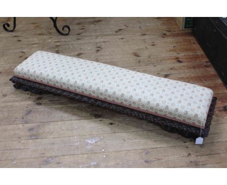Victorian carved mahogany long footstool in tapestry fabric, 115cm long.