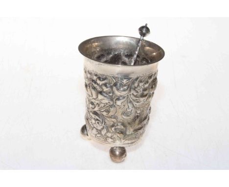 Scandinavian embossed silver beaker on ball feet, 12cm, and an anointing spoon (2).