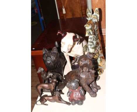 Brass Scottie dog door stop, two bronze greyhounds, Nipper and three other dog ornaments and small teddy ornament.