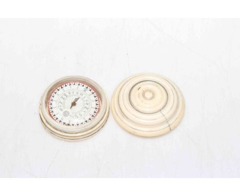 Antique ivory cased pocket compass, 5.7cm diameter.