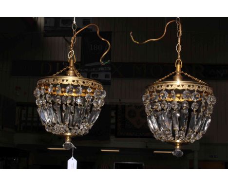 Pair of early 20th Century cut glass light fittings.