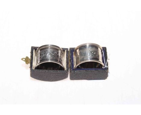 Pair of silver napkin rings with engraved decoration, Birmingham 1923 (one box).