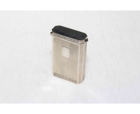 Silver engine-turned snap top cigarette case with hinged floor, Birmingham 1959, 7.5cm by 5cm.