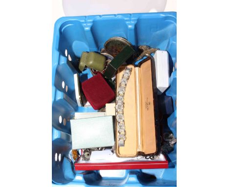 Box with many silver rings and other jewellery.